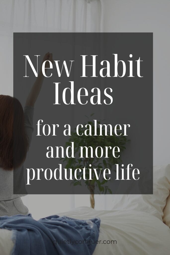 Text reads: New Habit Ideas for a Calmer & More Productive Life." Image is of a woman sat on her bed stretching arms above her head