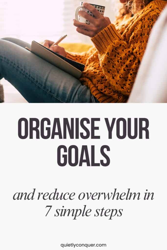 Text reads - Organise Your Goals and Reduce Overwhelm in 7 Simple Steps. Image of a woman sat comfy with laptop on lap
