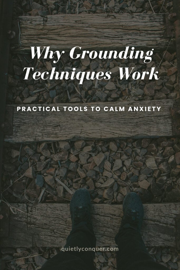 A faded image of wooden tracks with text "Why Grounding Techniques Work A Practical Guide to Calm Anxiety"