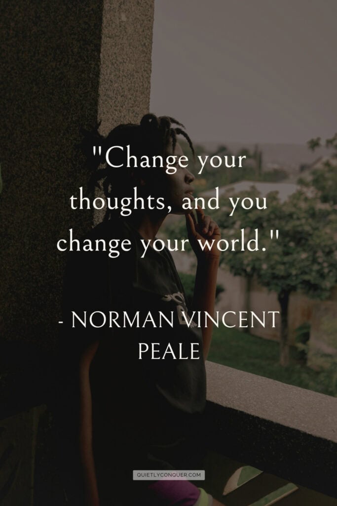 Woman looking outside on balcony - quote reads. - "Change your thoughts, and you change your world."
- Norman Vincent Peale